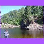 Woman Swimming In River.jpg